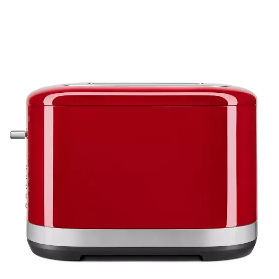2-szeletes, piros színű kenyérpirító teljes oldal nézetben jobb oldalról.